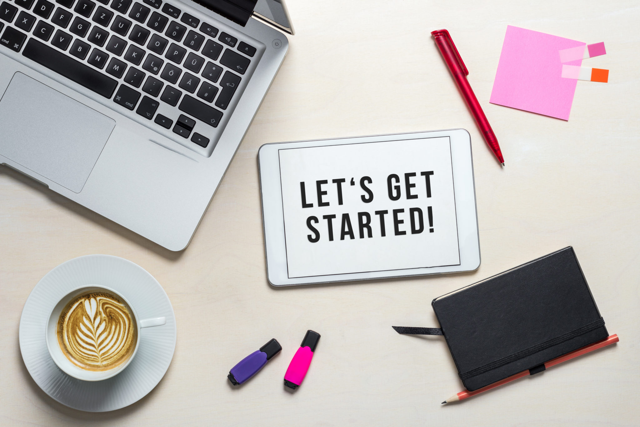 I can get started. Get started. Let's get started Сток. Let's start фото. Планшет лежит на столе.